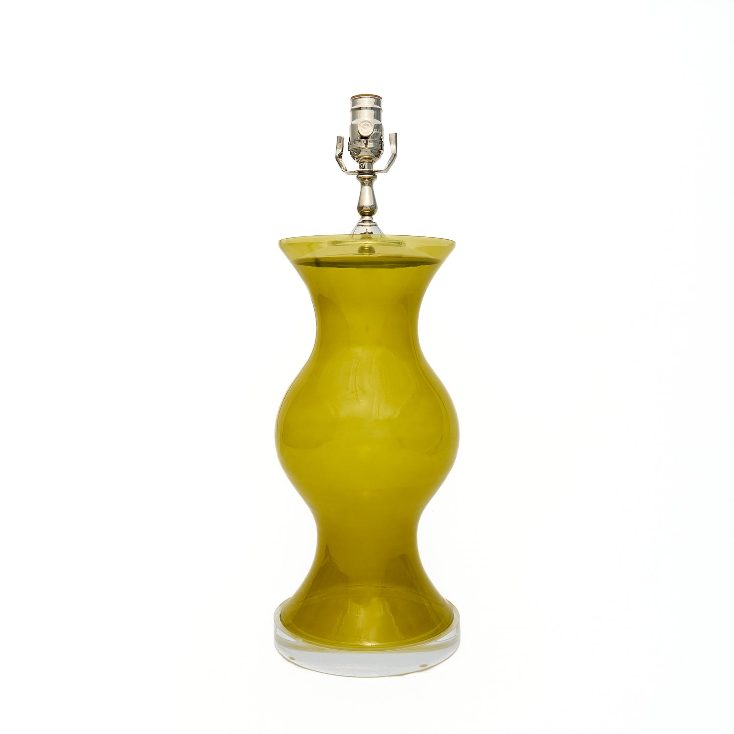 Citron green lamp with a lucite base on a white background