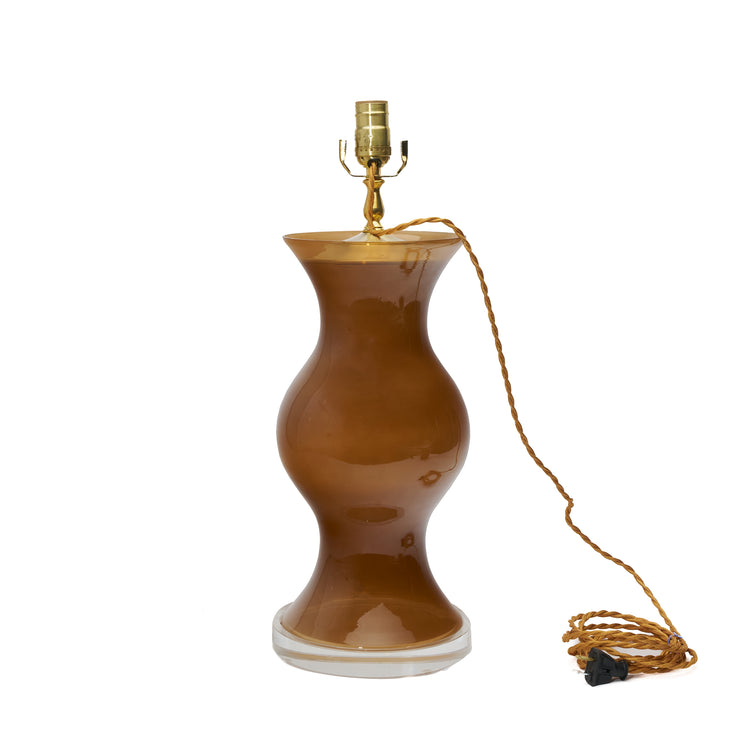 Coffee brown lamp with a lucite base on a white background